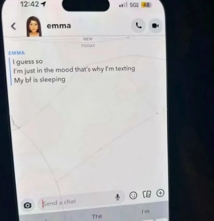 A chat screen displaying a text message next to a visible crack on the phone screen.