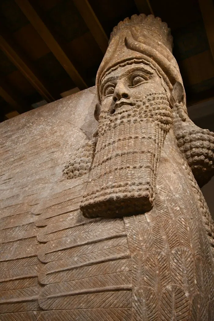 Ancient Assyrian winged guardian statue close-up