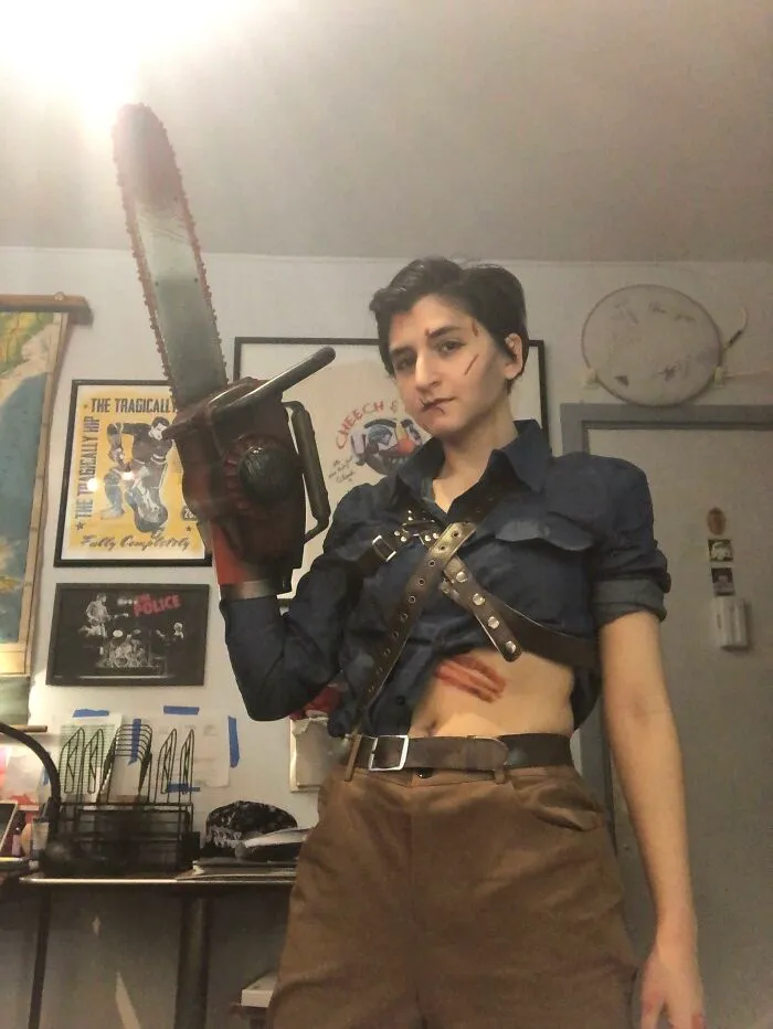 Person dressed as Ash Williams with chainsaw arm for creative Halloween costume idea