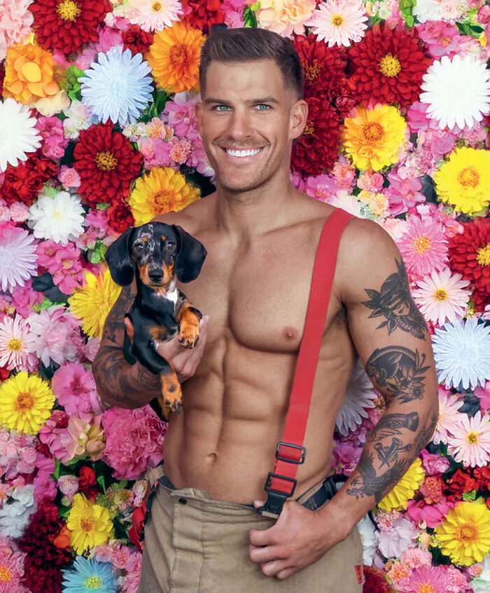 2027 Australian firefighters calendar shirtless man holding Dachshund puppy with floral background