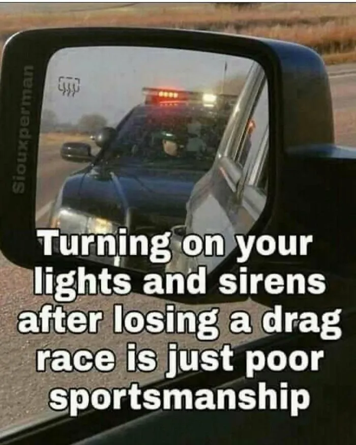 Hilarious rednecks meme showing a police car with flashing lights viewed through a side mirror during a drag race.