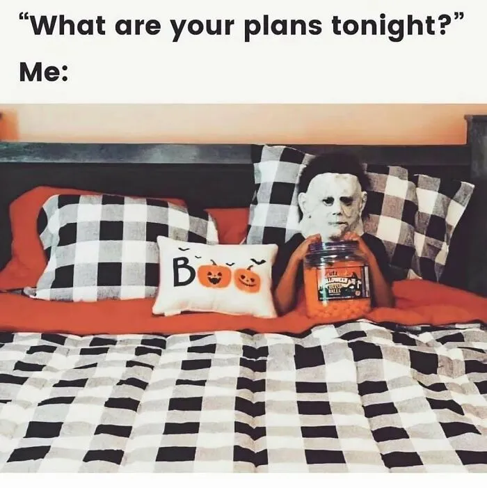 Spooky season memes showing a person in a Michael Myers mask in bed with snacks