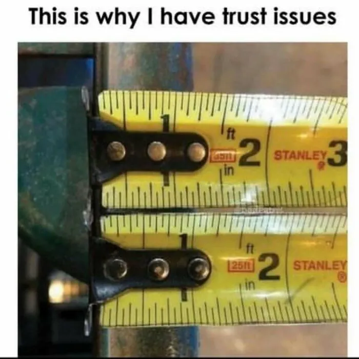 Two tape measures misaligned, showing why people have trust issues in a relatable meme.