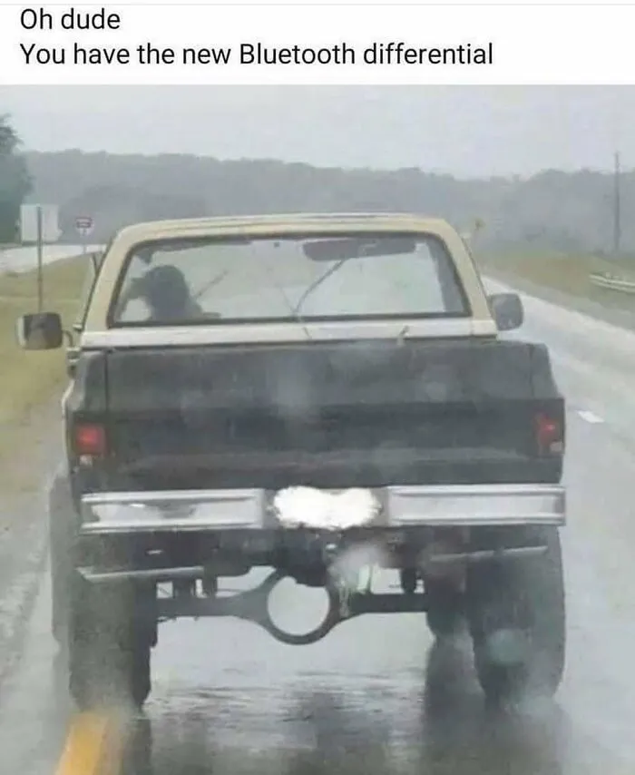 Hilarious rednecks meme featuring a pickup truck driving in the rain missing its rear differential housing.