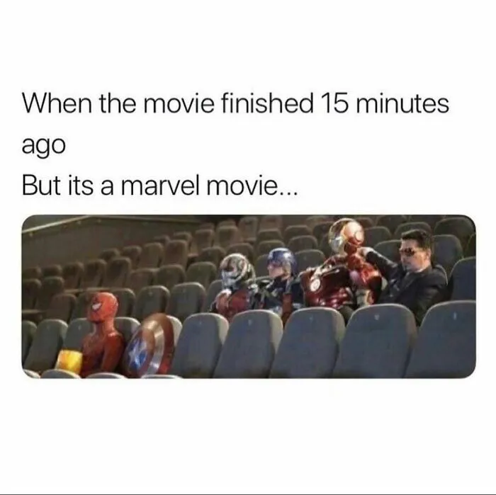 Marvel superheroes waiting in a theater seat in a funny meme to send to friends who love movies.
