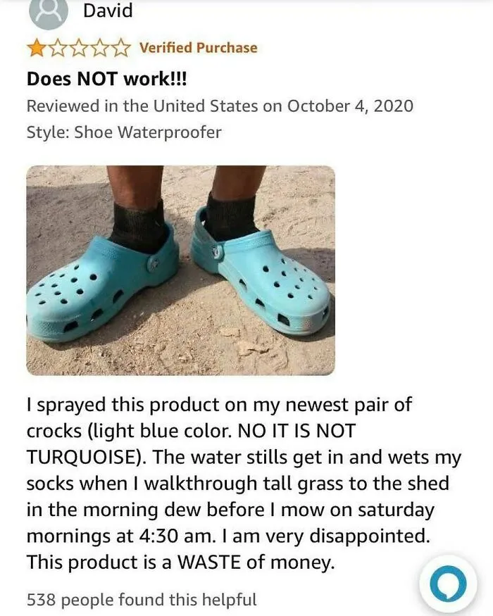 Funny product review complaining about shoe waterproofer on perforated light blue Crocs.