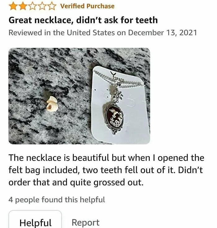 Funny product review showing a necklace that unexpectedly included two teeth in the package.