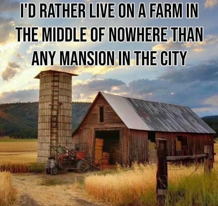 A redneck memes post showing a rural farm scene with a wooden barn, silo, and farm equipment under a sunset sky.