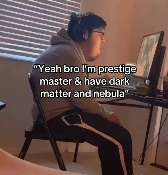 Meme of a gamer sitting with poor posture, boasting about prestige master status, showcasing a nerdy sense of humor.