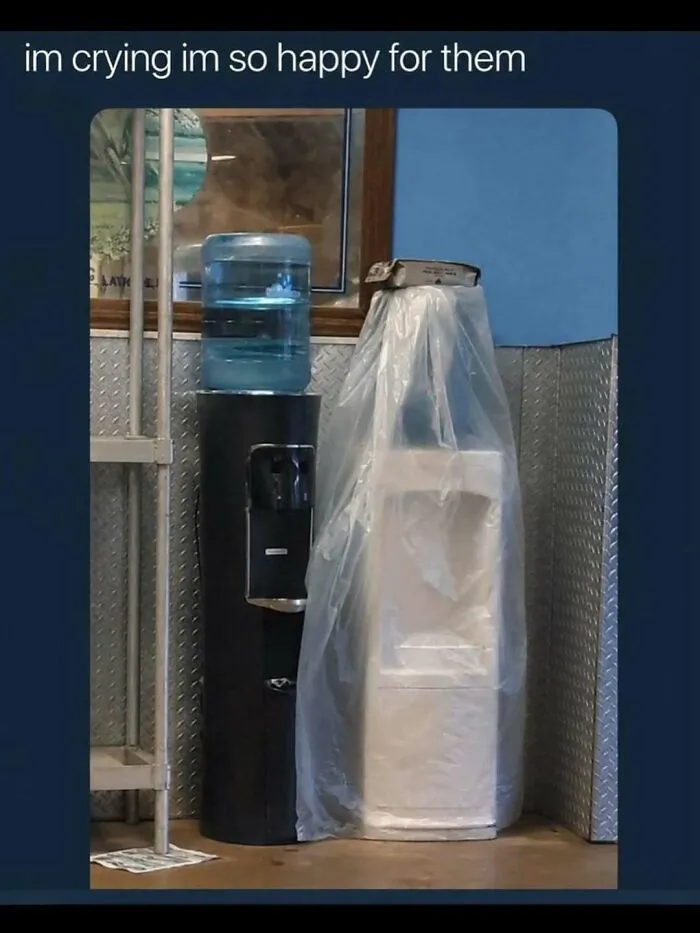 Relatable meme of a black and white water dispenser standing together like a wedding couple