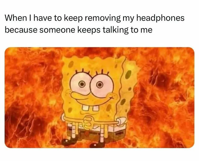 SpongeBob surrounded by fire showing frustration of removing headphones meme