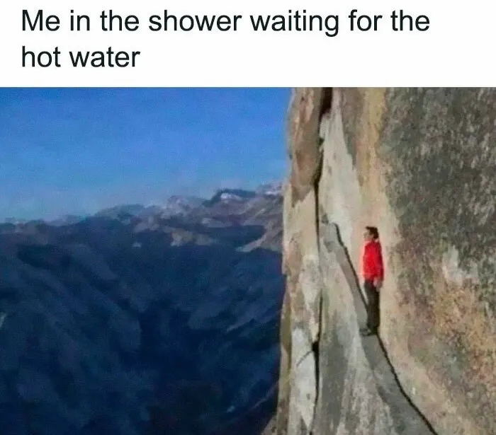 Person standing on narrow cliff edge meme for waiting for hot water