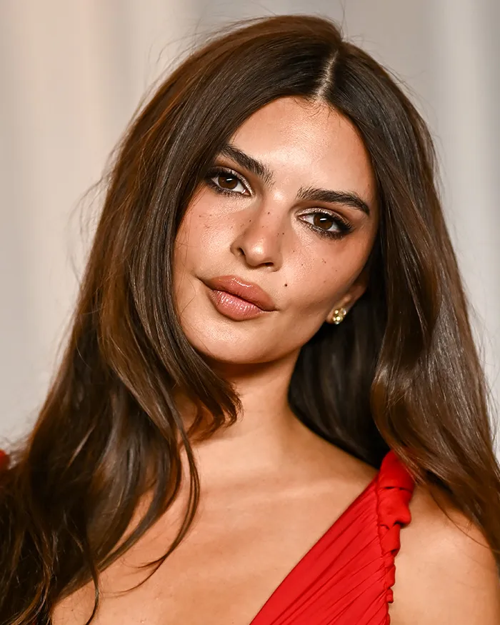 Unedited photo of Emily Ratajkowski in a red dress at the Academy Museum Gala.