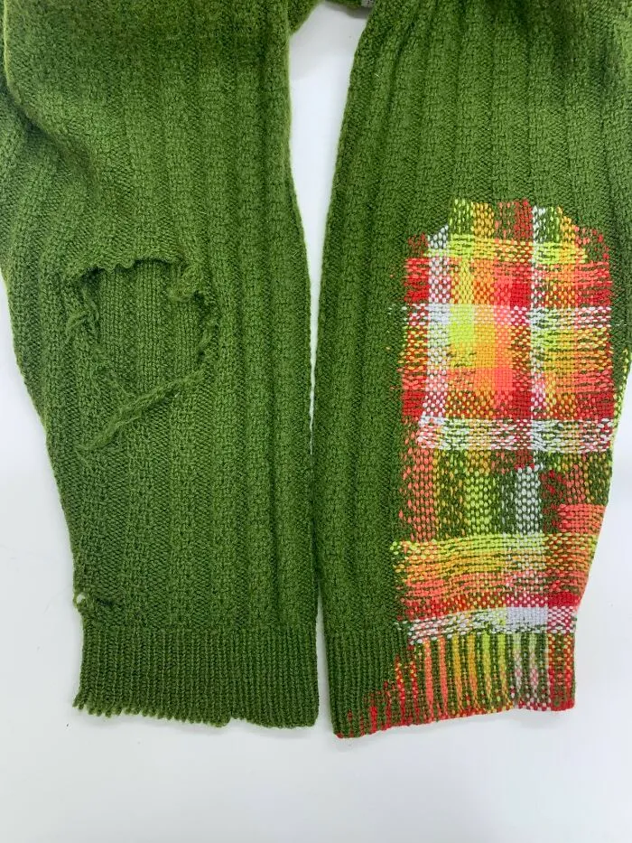 Before and after visible mending on a torn green sweater cuff showing how creativity saves money