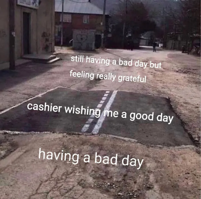 Wholesome memes photo of a paved patch on a dirt road illustrating a slight day improver.