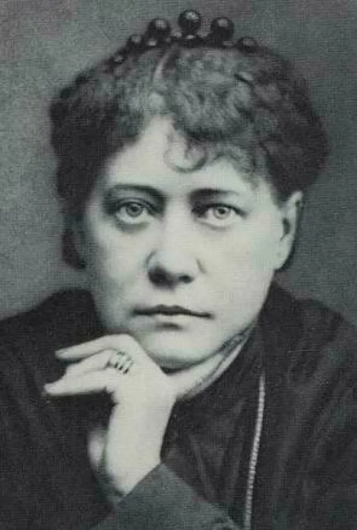 A black and white portrait of a woman, representing figures associated with lesser-known cults.