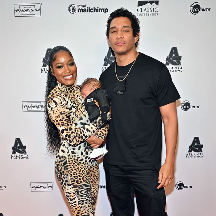 Hollywood actress Keke Palmer looking surprised in a green jacket