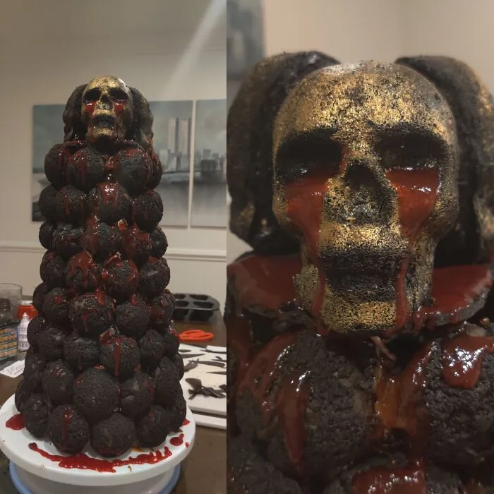 Creepy Halloween foods featuring a croquembouche tower topped with a gold skull dripping fake blood.