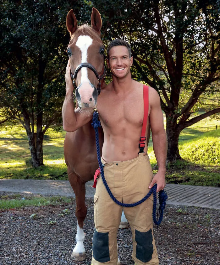 Australian firefighter posing with horse in 2027 firefighters calendar