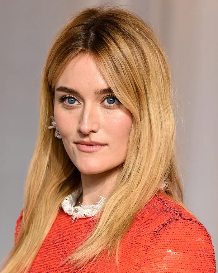 Unedited photo of a blonde star in a red dress at the 2026 Academy Museum Gala
