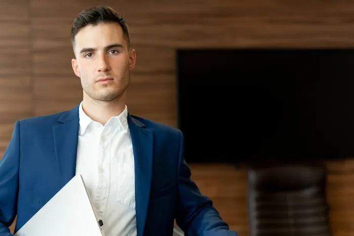 Serious looking businessman who has found secrets
