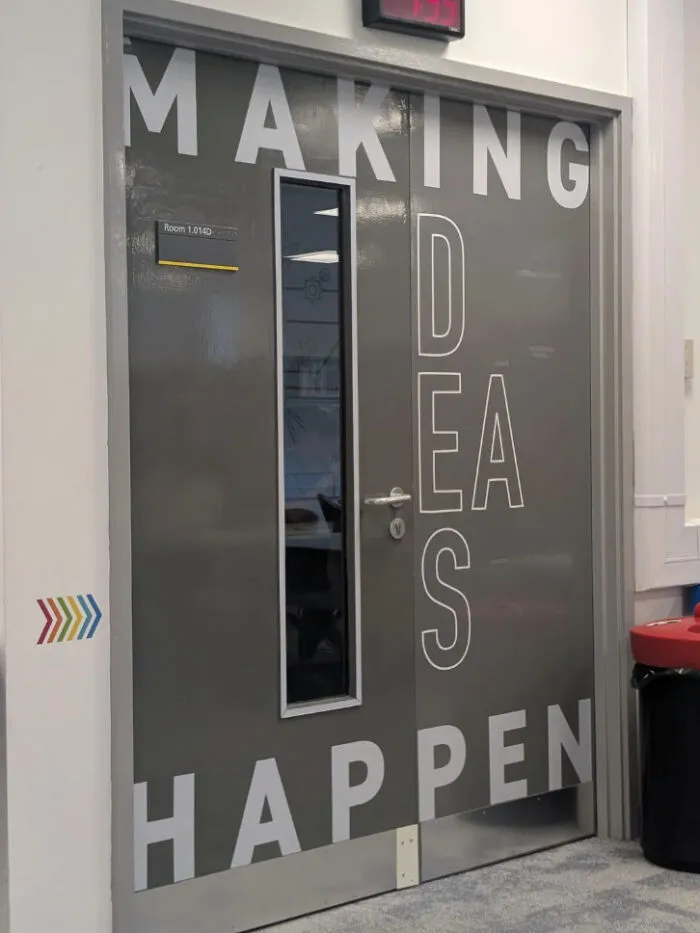 Door with confusing text design spelling making ideas happen