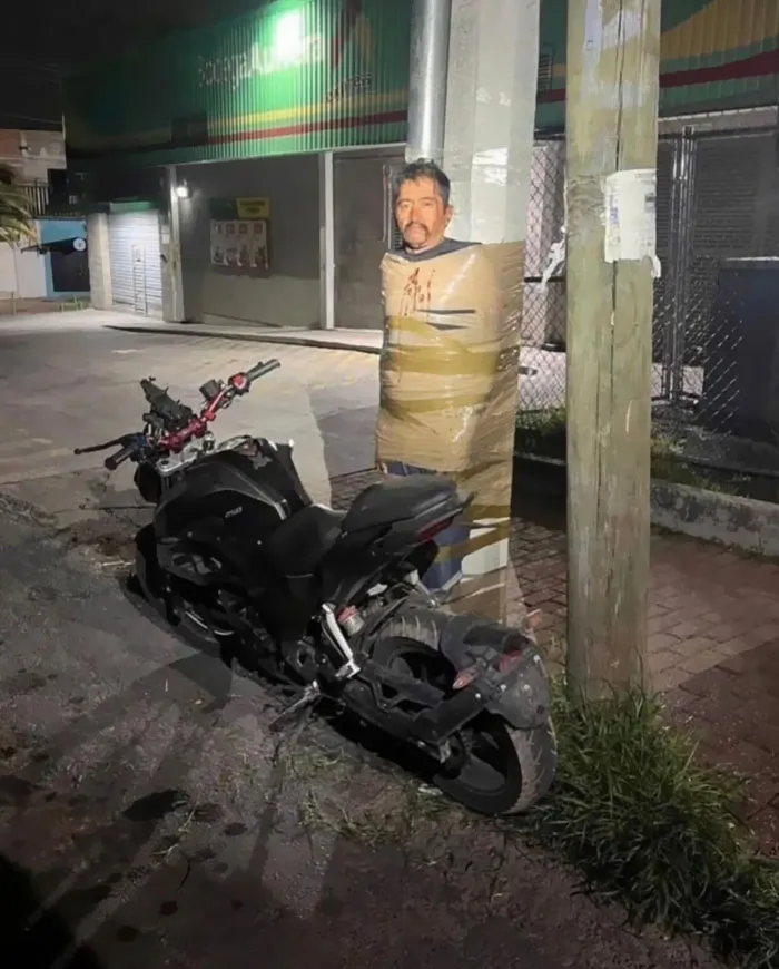 "Mexican Batman", A Mysterious Dude Who Hunts Down Motorcycle Thieves & Tape Them To Poles In Mexico