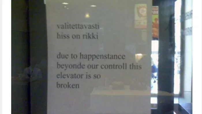 Sign with translation fails stating due to happenstance beyond control this elevator is so broken