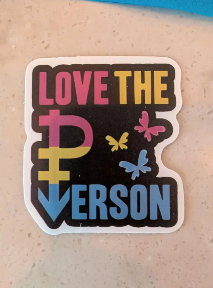 Sticker with colorful love the person design and butterflies