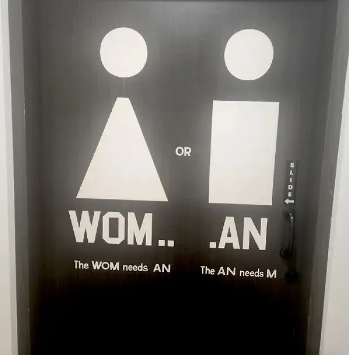 Confusing restroom door design with incomplete words causing misinterpretation