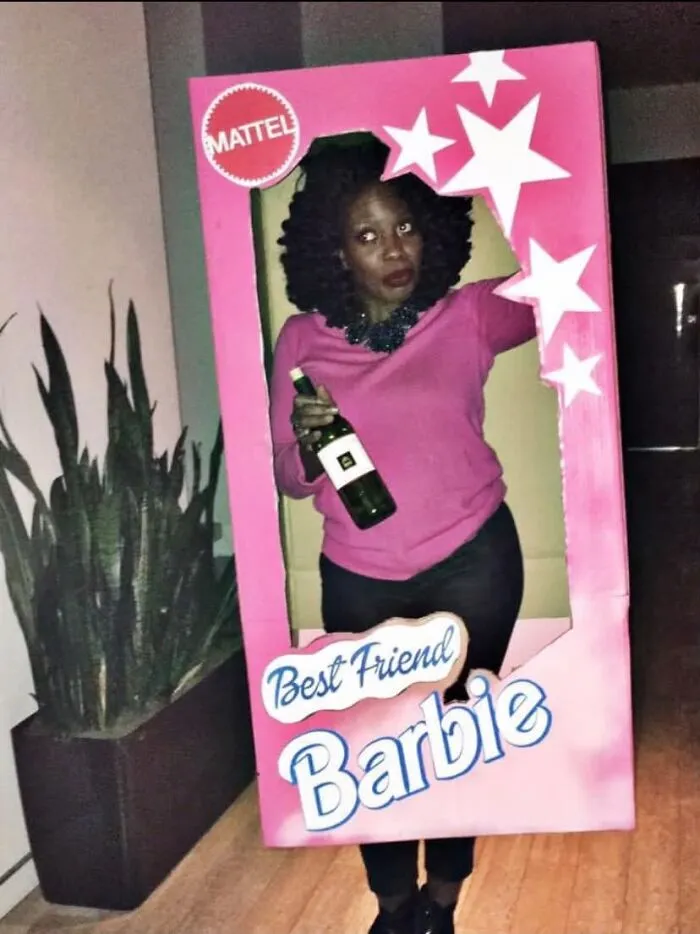 Woman wearing a Best Friend Barbie box outfit showcasing fun Halloween costumes