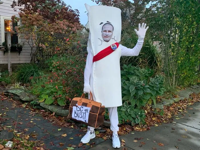 Person dressed as a bill from I'm Just a Bill, showcasing clever Halloween costumes