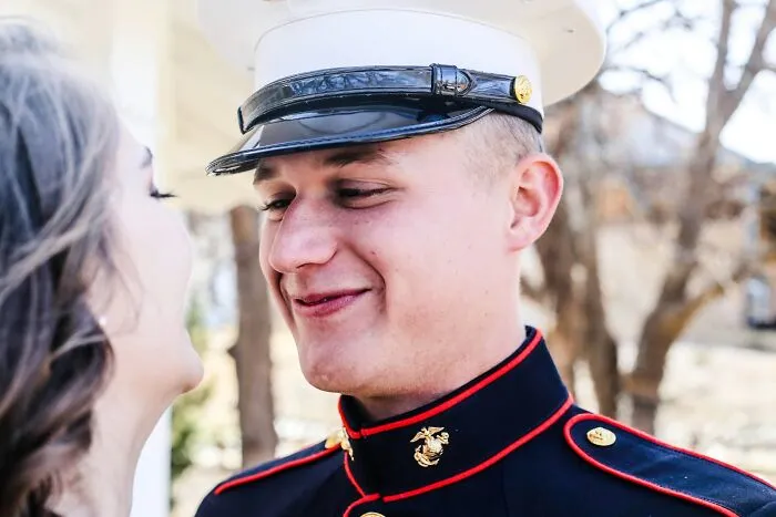 A military officer in uniform standing near a woman, representing painful infidelity stories and betrayal.