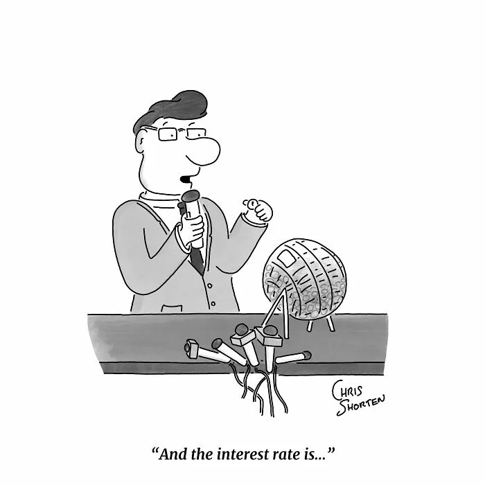 Single-panel comic by Chris Shorten showing a news host drawing interest rates from a lottery cage.