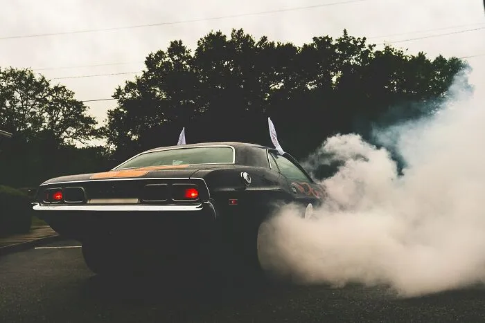 Why Do Tires Produce White Smoke During A Burnout, But Black Smoke When They’re Burned In A Pile?