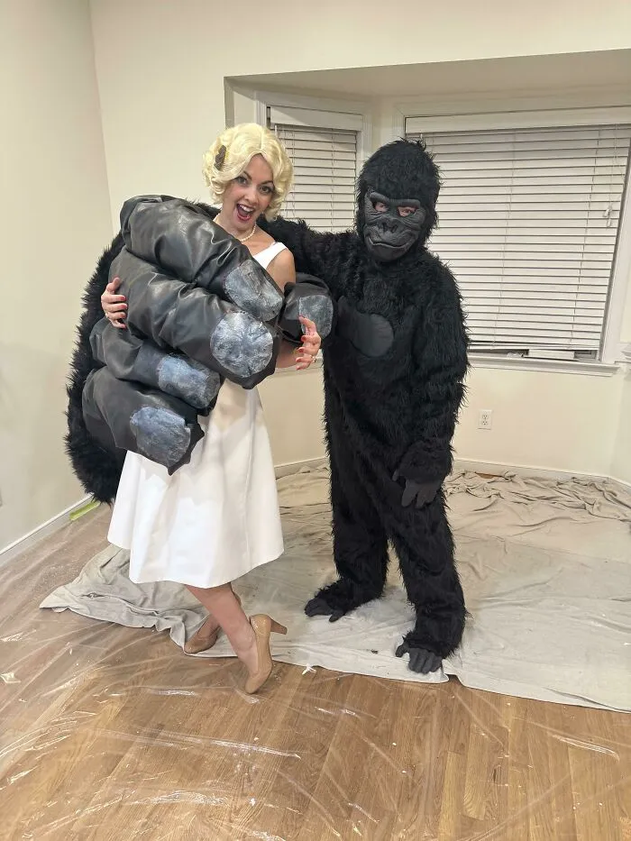 A couple dressed in a King Kong and Ann Darrow theme for creative Halloween costume ideas.