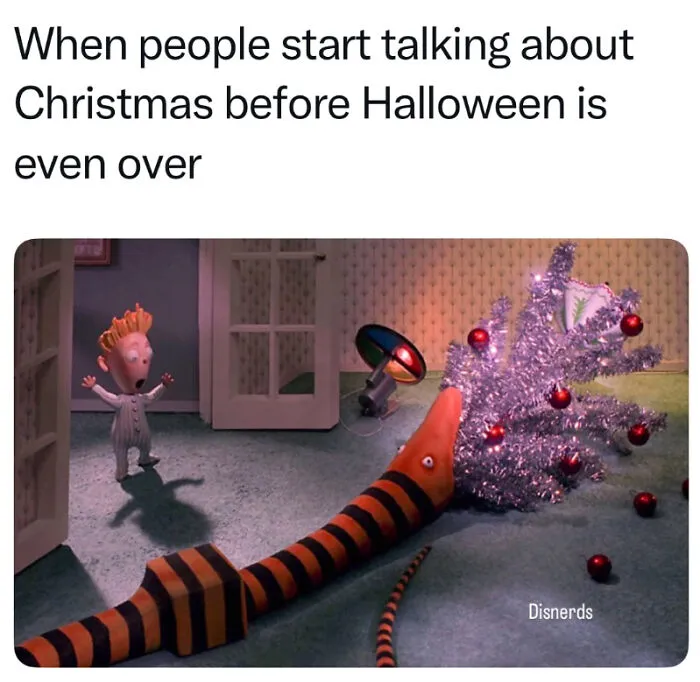 Halloween meme showing a claymation snake eating a Christmas tree to protect the spooky season.