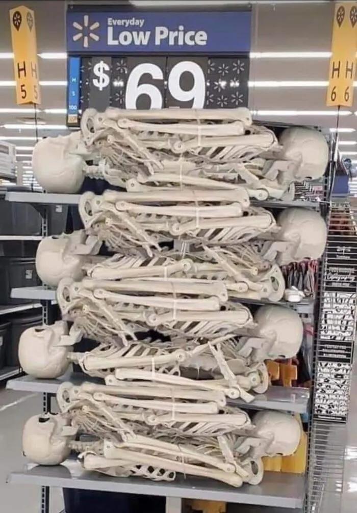 Spooky Halloween memes showing a stack of plastic skeletons for sale in a store