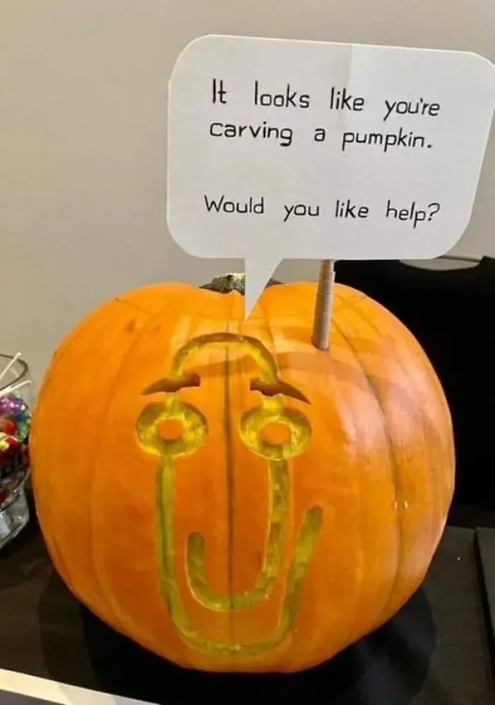 Funny pumpkin carving featuring Clippy in Halloween memes style