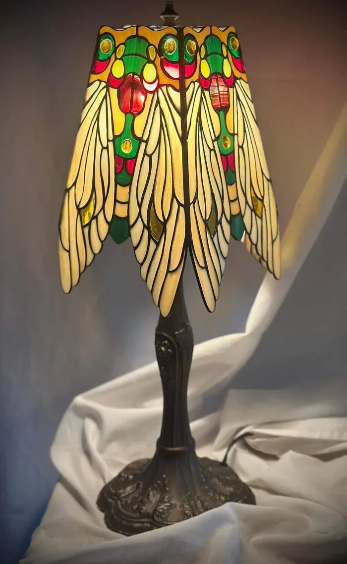 An intricate stained glass lamp added during a homes makeover.