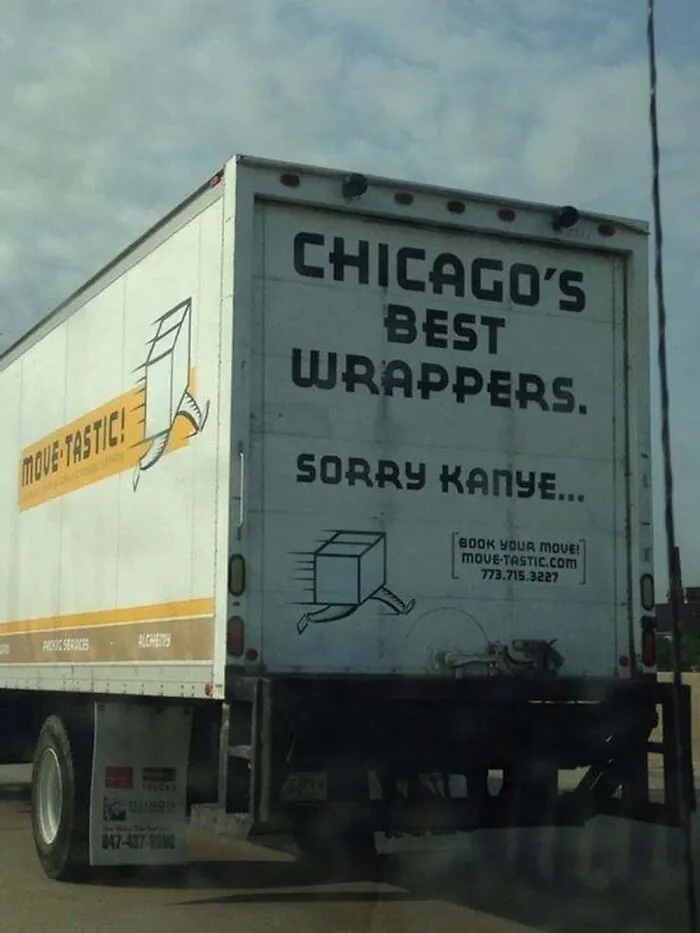Moving truck with funny text saying Chicagos Best Wrappers, an example of truckers making giant moving jokes