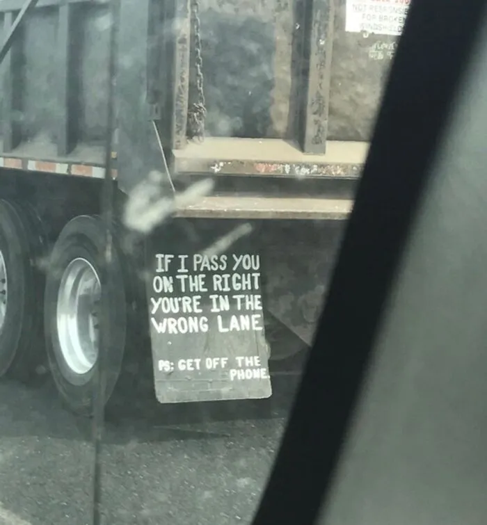 Mud flap with funny driving advice, showing truckers who turned their vehicles into jokes