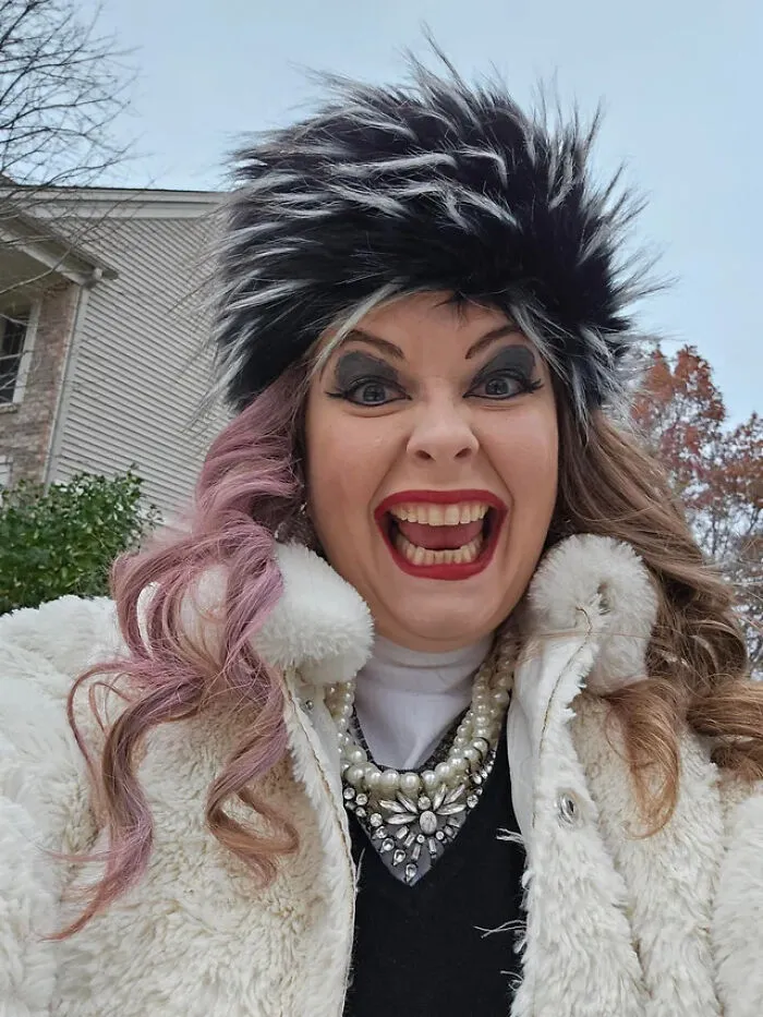 A woman dressed as Cruella de Vil for a cool Halloween costume idea.