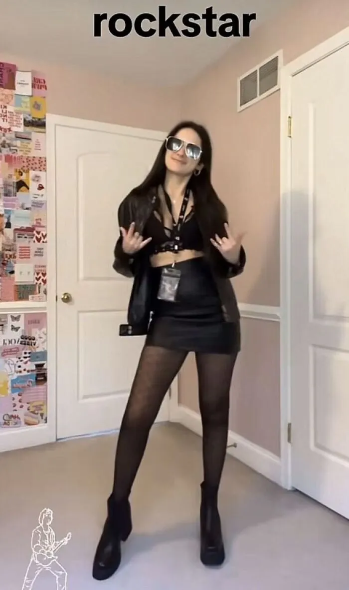 A woman wearing a black jacket and sunglasses as a last minute rockstar Halloween costume idea.