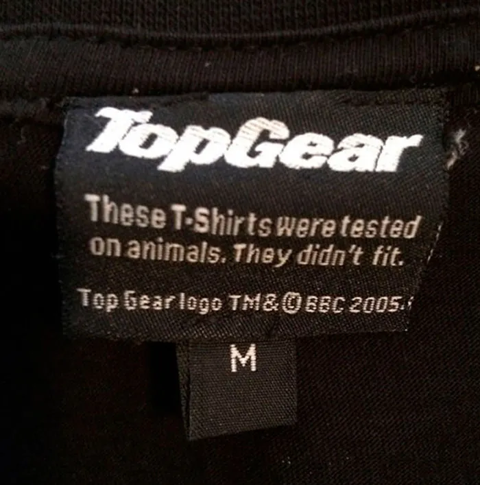 A Top Gear shirt tag featuring hilariously confusing instructions about testing on animals.