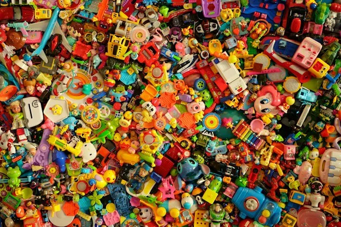 Colorful collection of small plastic toys discovered as dumpster finds