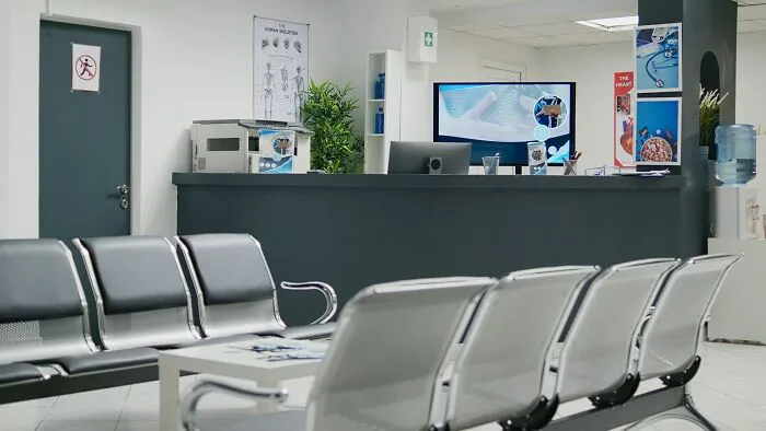 An empty waiting room in a clinic, context of unexpected relationship fights.