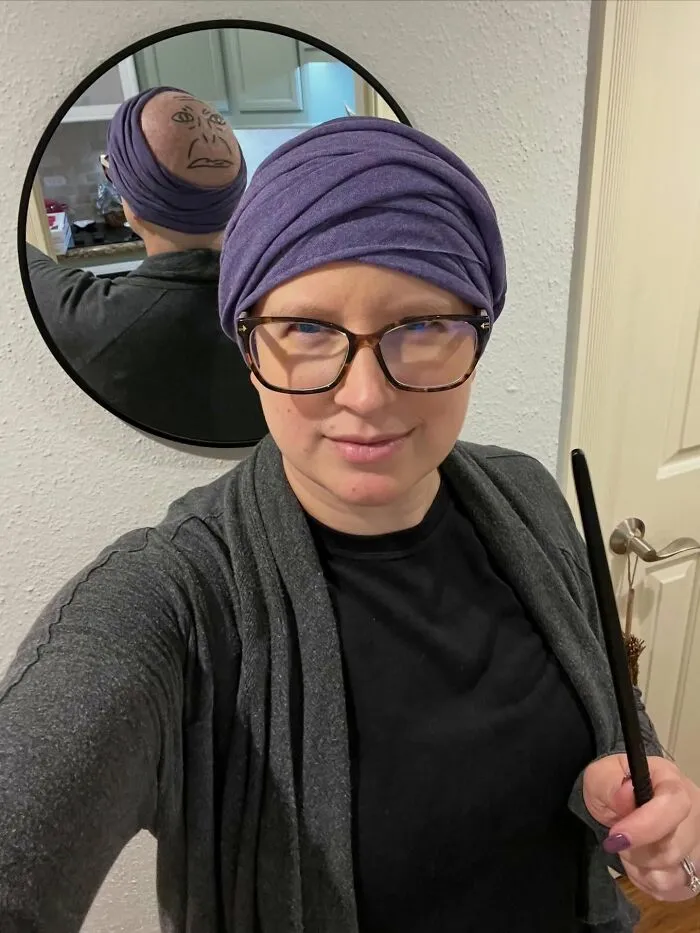 Person in a purple turban holding a wand for a creative Halloween costume idea