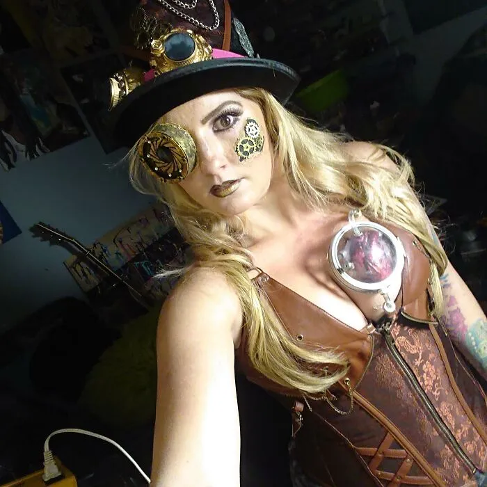 A woman wearing an intricate steampunk outfit with gears and goggles for creative Halloween costume ideas.