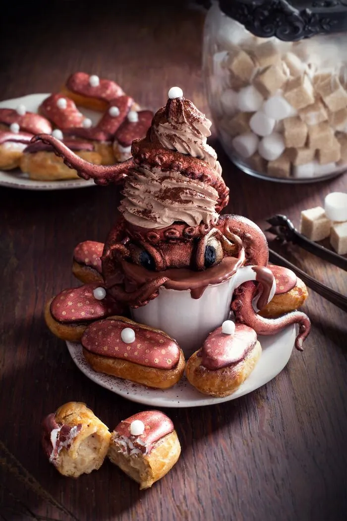 Intricate sea monster dessert presented as artistic Halloween foods in a teacup
